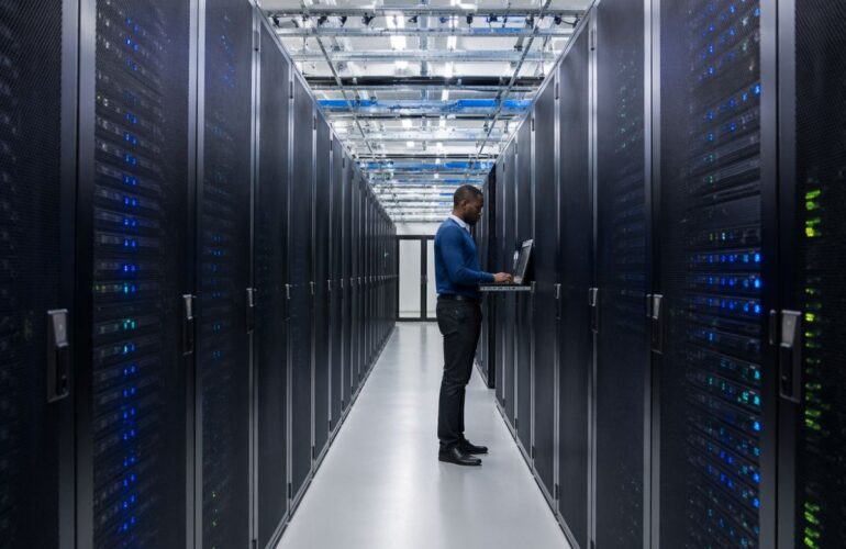 data center with a technician working in it